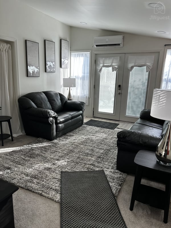 Well lit living room/sitting room area — Immaculate one King bed apartment in North Versailles, Allegheny County, Pennsylvania