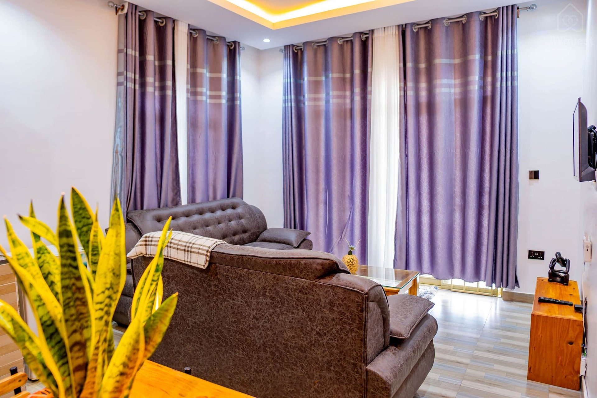 View of the living room from the entrance of the house — Cozy 2-Bedroom Haven Near KGL Airport - Valley View, Kigali, Kigali City