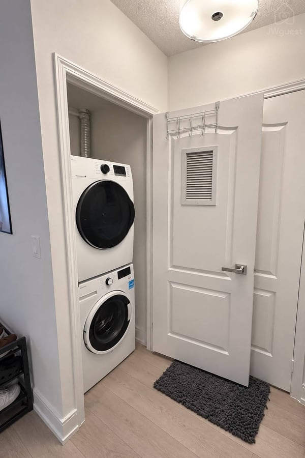 New washer- dryer — Downtown Toronto Stay | Steps from CN Tower & King West, Toronto, Ontario