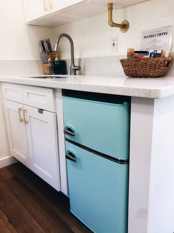 The compact kitchen has everything you need with a mini fridge/freezer, microwave, induction cook top, kettle, a French… — Elevated Jungle Treehouse with Loft BR, Mililani, Hawaii