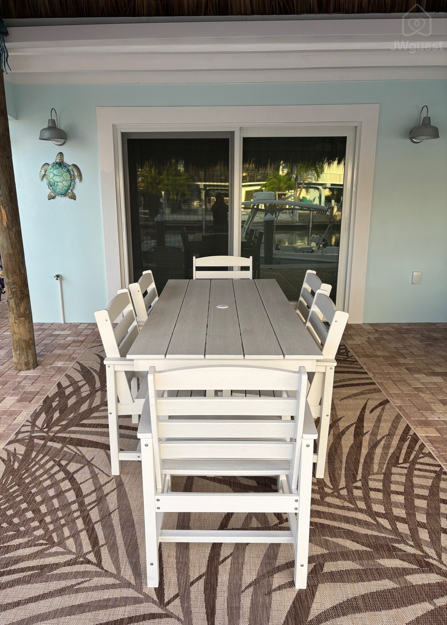 Outdoor dining — Waterfront 3BR 3BA with 37 ft Dock Tiki Hut Access to Club Pool, Key Colony Beach, Florida