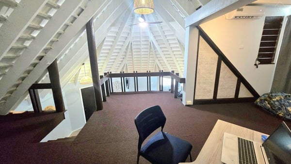 Desk and workspace in an open upstairs loft — Villa Tautai, Pacific Harbour, Central Division