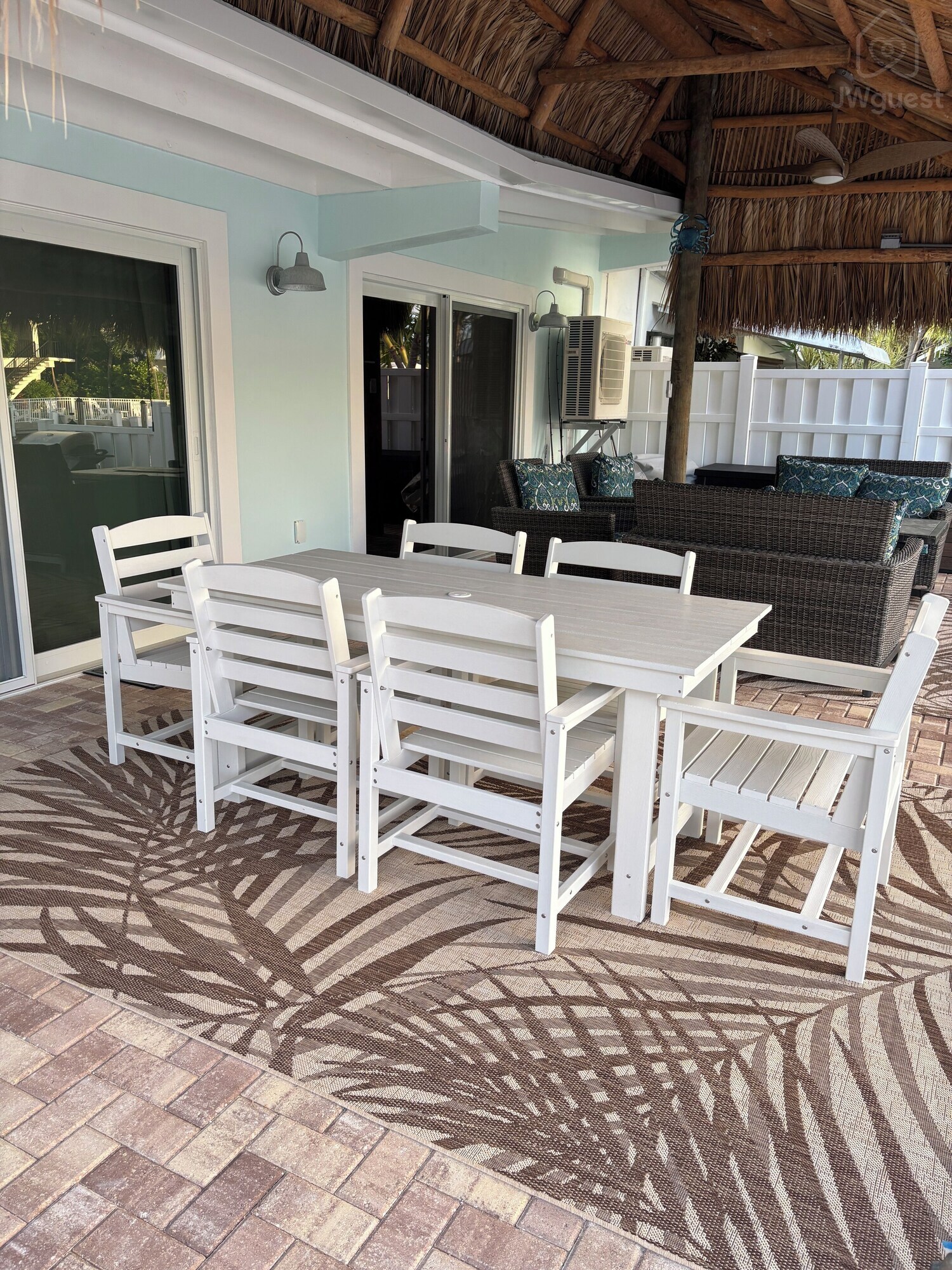 Outdoor dining — Waterfront 3BR 3BA with 37 ft Dock Tiki Hut Access to Club Pool, Key Colony Beach, Florida