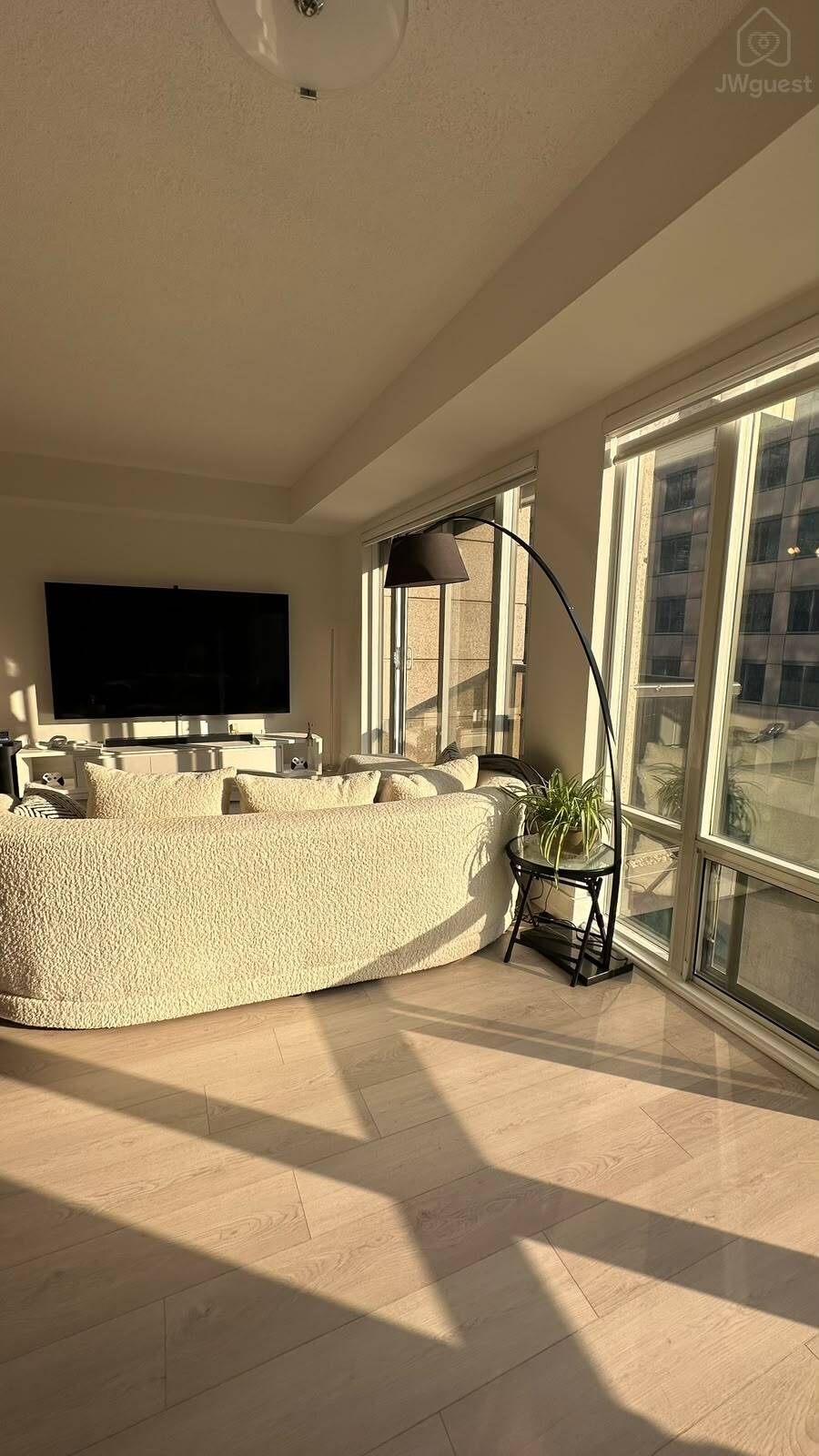 Sun-filled open living space with expansive windows — Downtown Toronto Stay | Steps from CN Tower & King West, Toronto, Ontario