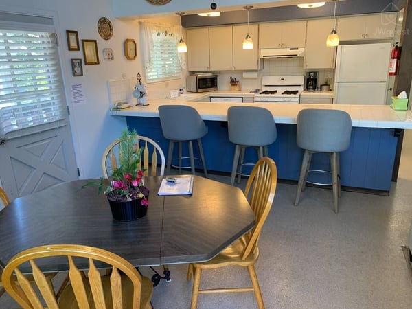 Dining area & fully equipped kitchen — Wooded Quiet Secluded South Lake Tahoe Chalet, South Lake Tahoe, California