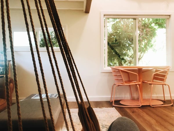 Relax and read a book in the swinging hammock chair — Elevated Jungle Treehouse with Loft BR, Mililani, Hawaii