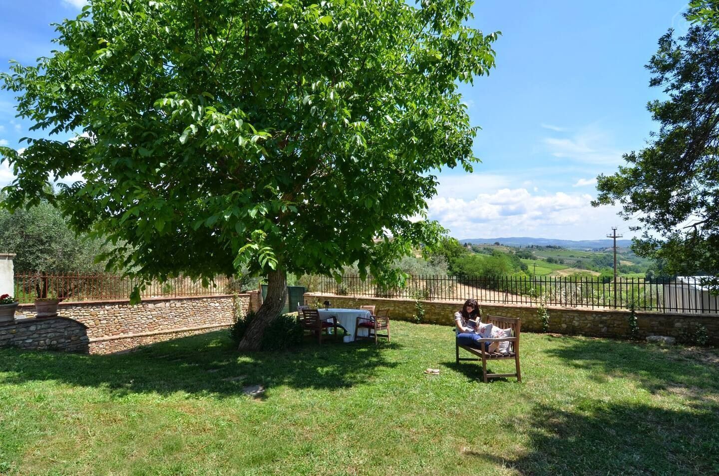 There's a garden with a stunning view of the vineyards. — The Barn under the Tuscan countryside, Tavarnelle, Toscana