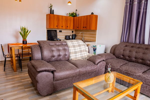 Open space - Living room, Sitting area & Kitchen — Cozy 2-Bedroom Haven Near KGL Airport - Valley View, Kigali, Kigali City