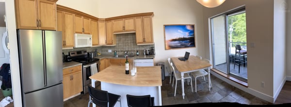 Kitchen with a view of the patio — Pacific Rim Retreat, Tofino, British Columbia