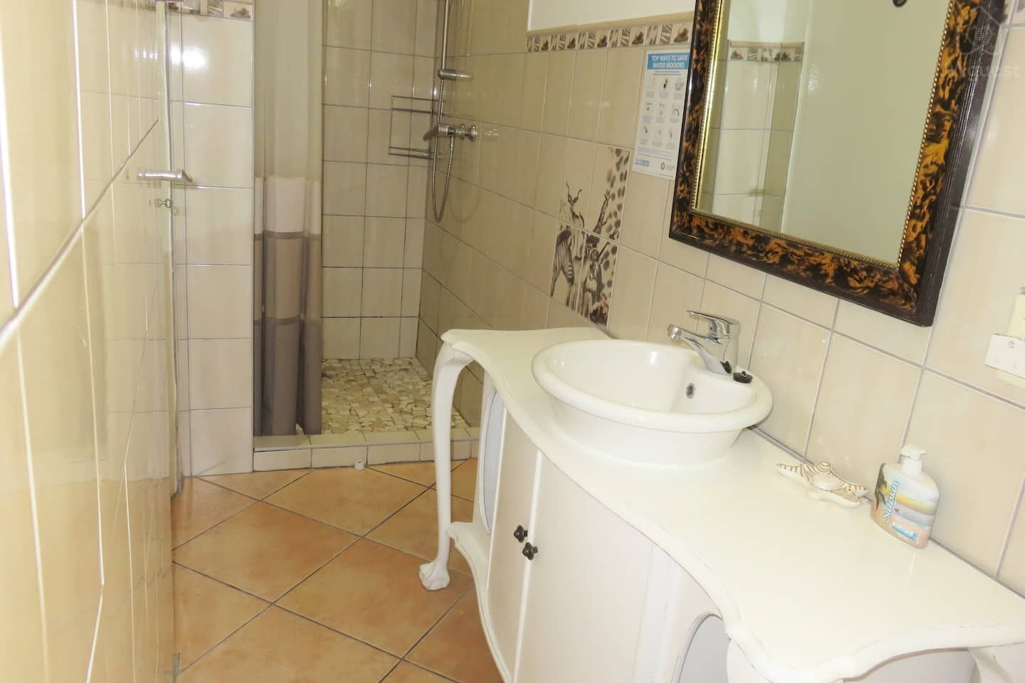 Bathroom with rain shower, toilet & vanity — Wonderful Studio Apartment between 2 Oceans #2, Cape Town, Western Cape