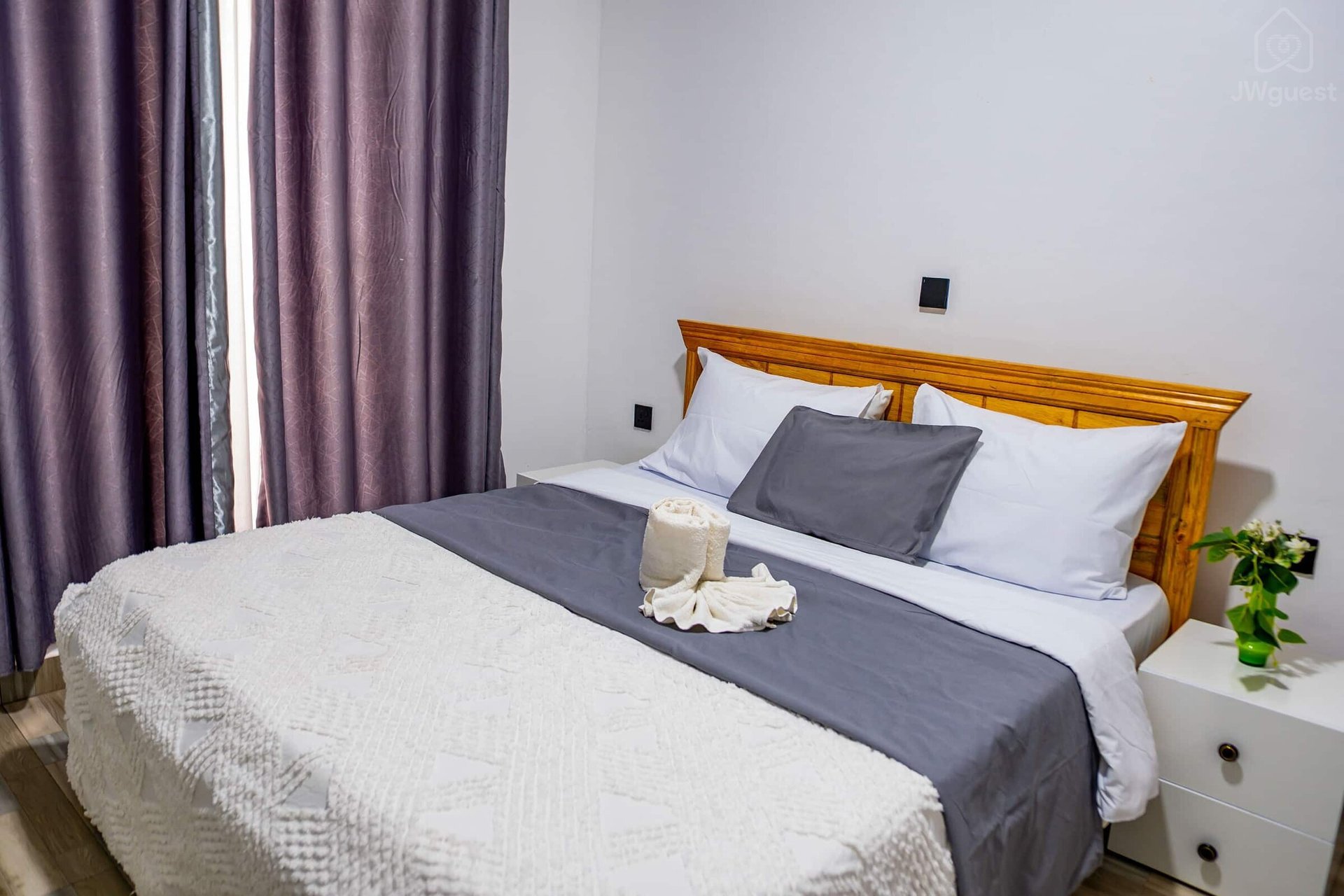 Bedroom 2 - with a comfortable bed, newly furnished for your comfort and cozy sleep. There are also two bed side tables… — Cozy 2-Bedroom Haven Near KGL Airport - Valley View, Kigali, Kigali City