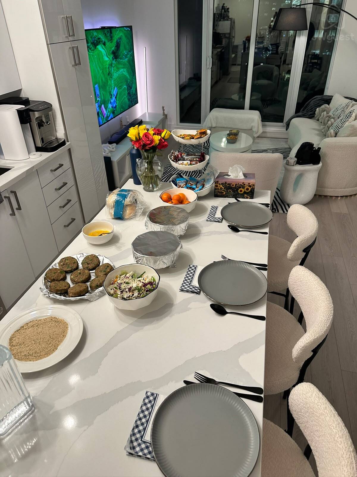 Dedicated dining island with plenty of seating for shared meals — Downtown Toronto Stay | Steps from CN Tower & King West, Toronto, Ontario