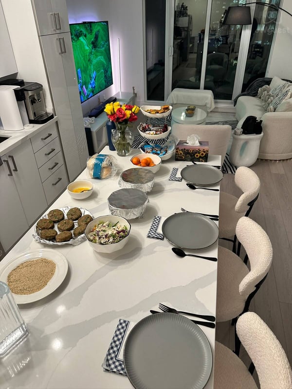Dedicated dining island with plenty of seating for shared meals — Downtown Toronto Stay | Steps from CN Tower & King West, Toronto, Ontario