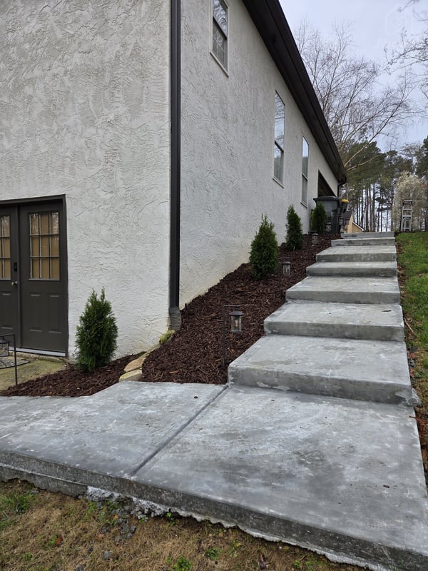 Stairs next to house. Follow these around to the private back yard to enter apartment. — New Modern 1 Bdr Apt 20 minutes from Atl airport, Sharpsburg, Georgia