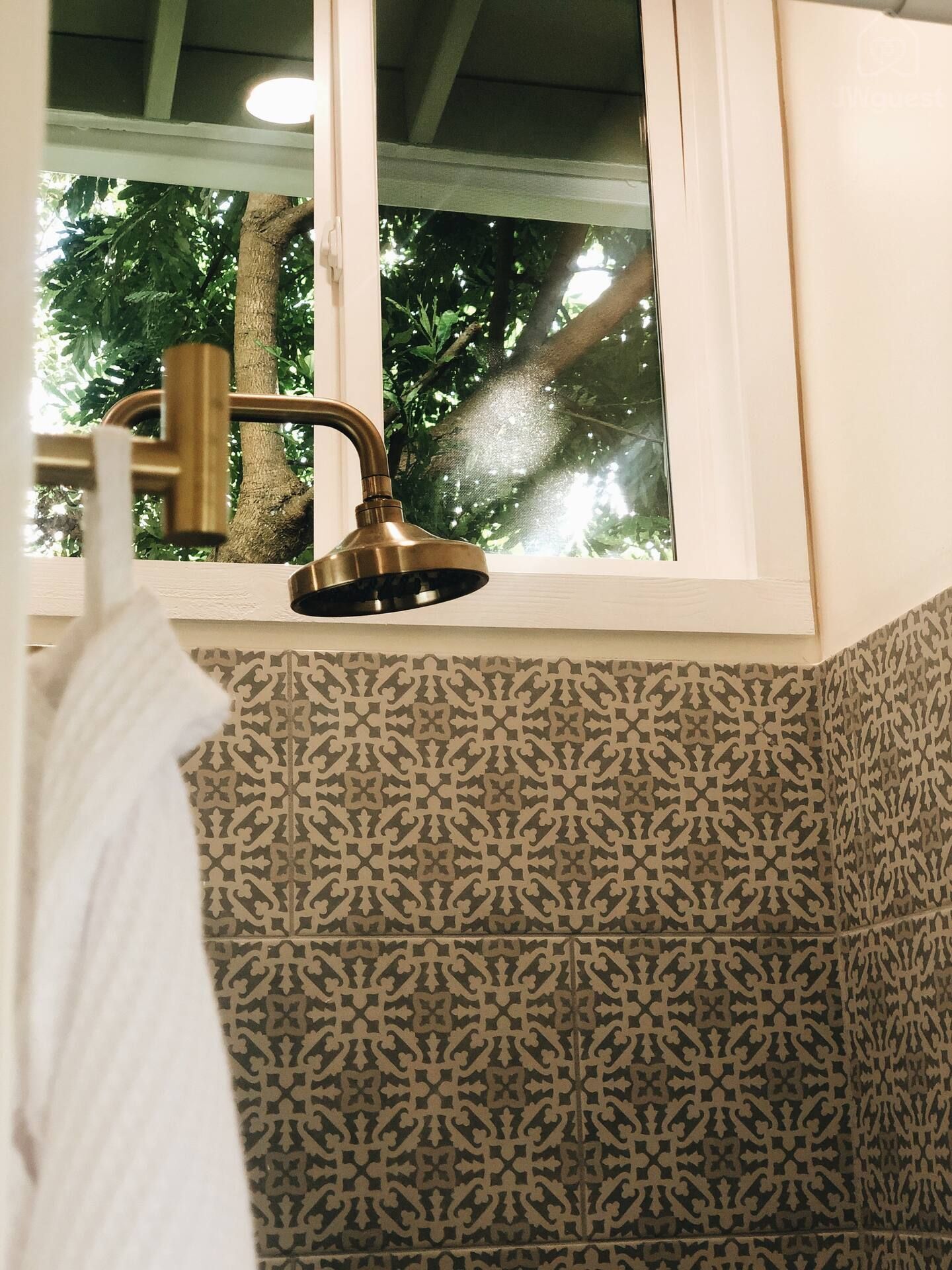 Wash up in the stylish shower complete with body wash, shampoo, conditioner and luxe guest robes so you can relax in… — Elevated Jungle Treehouse with Loft BR, Mililani, Hawaii
