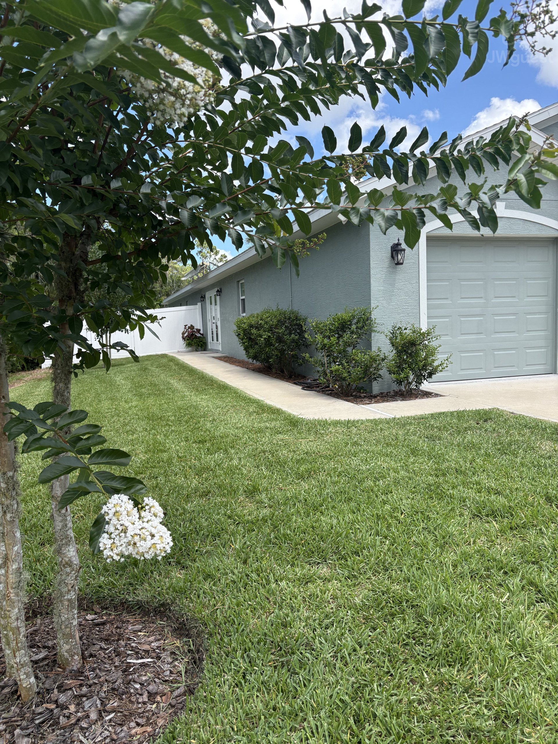 Walkway to guest entrance — Private Coastal Guesthouse Retreat, Palm Coast, Florida