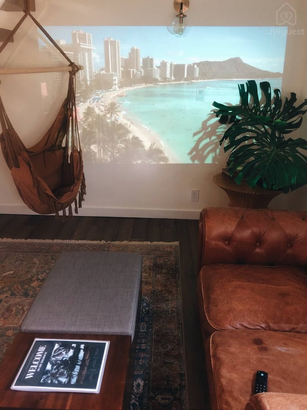 Get inspired watching surf movies or the latest box office hit on the living room projector! — Elevated Jungle Treehouse with Loft BR, Mililani, Hawaii