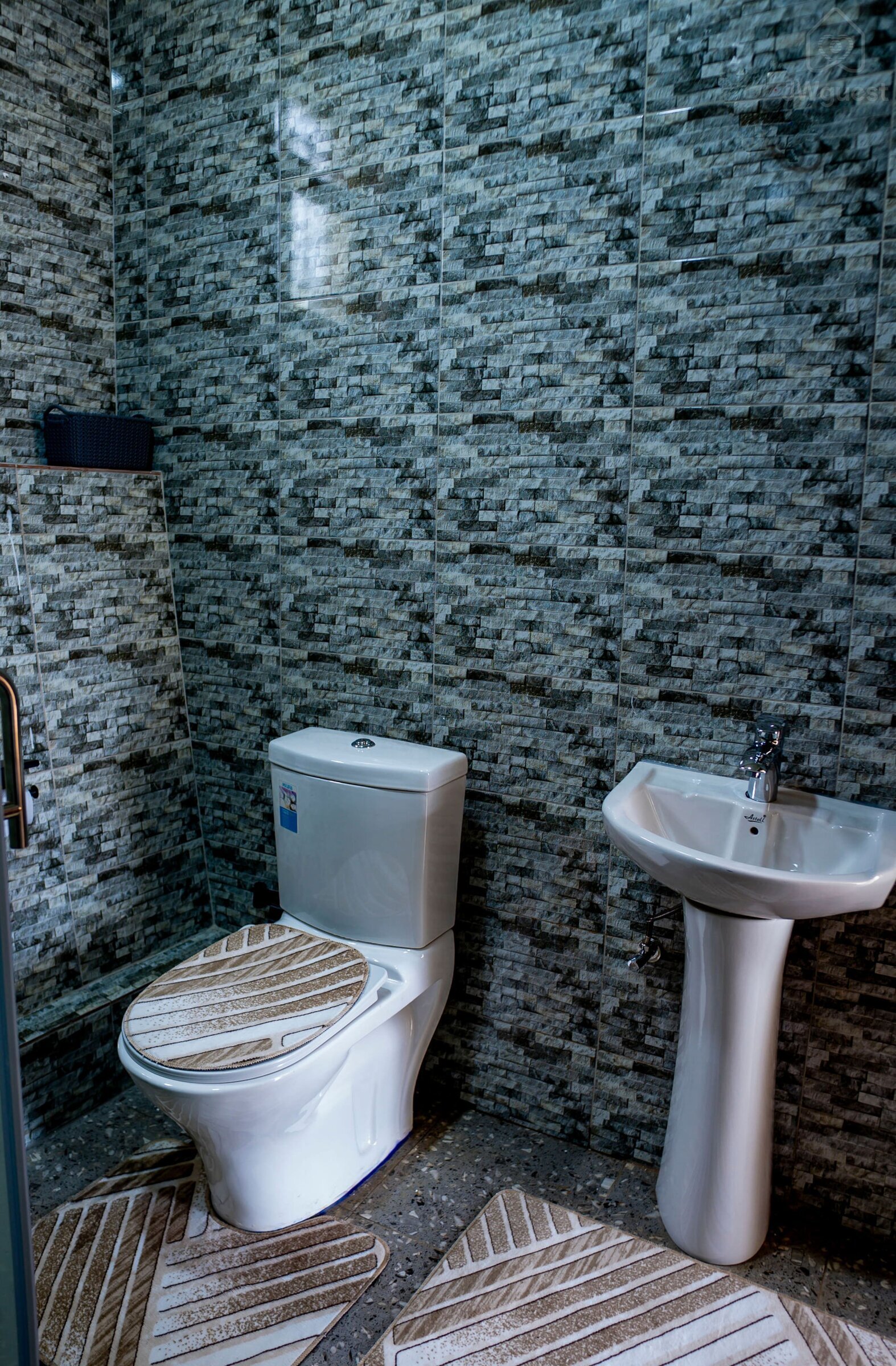 Bathroom 2 - newly renovated with a shower head and shower cubicle for your comfort and ease. — Cozy 2-Bedroom Haven Near KGL Airport - Valley View, Kigali, Kigali City