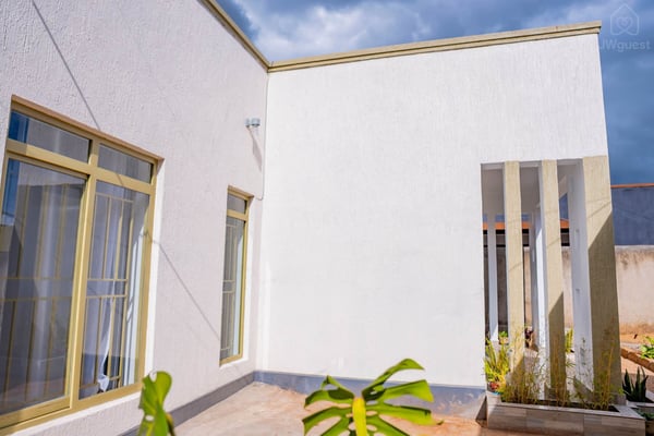 Side profile of the house — Cozy 2-Bedroom Haven Near KGL Airport - Valley View, Kigali, Kigali City