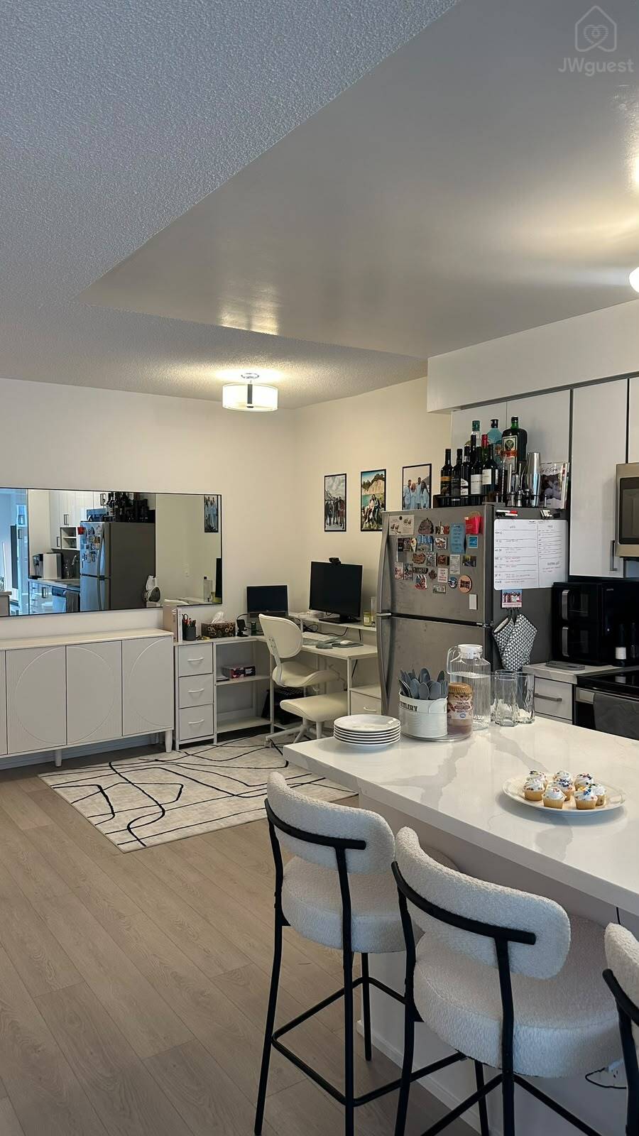 Modern kitchen island with bar seating for casual meals — Downtown Toronto Stay | Steps from CN Tower & King West, Toronto, Ontario