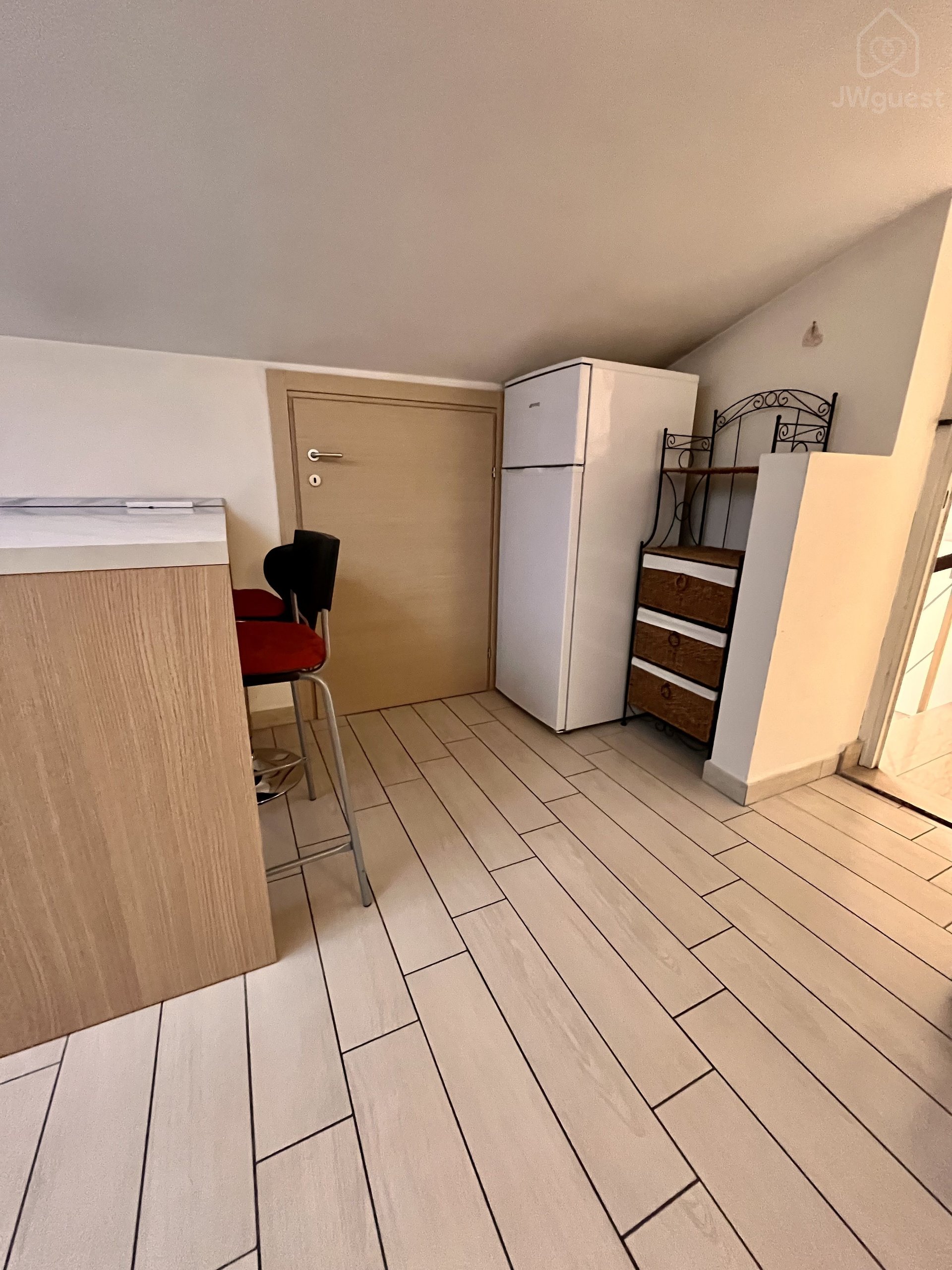 Fidge and freezer — Cozy Attic Apartment Kingdom Hall & Tram Stop and City Center, Firenze, Toscana
