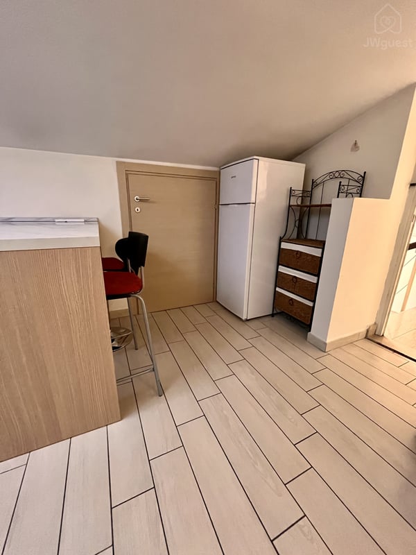 Fidge and freezer — Cozy Attic Apartment Kingdom Hall & Tram Stop and City Center, Firenze, Toscana