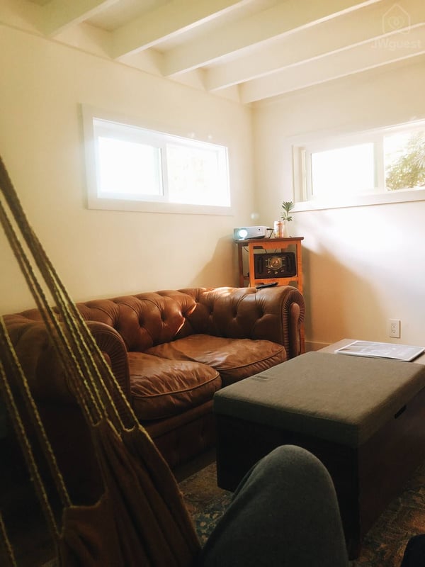 POV: Relaxing in the swinging hammock chair enjoying your favorite island playlist — Elevated Jungle Treehouse with Loft BR, Mililani, Hawaii