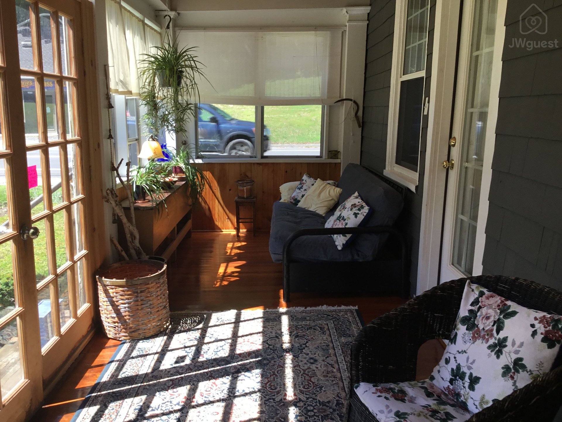 Guest sitting area on side porch and guest’s acc — Rooms on the River Free Parking Wi-Fi, South Lee, Massachusetts