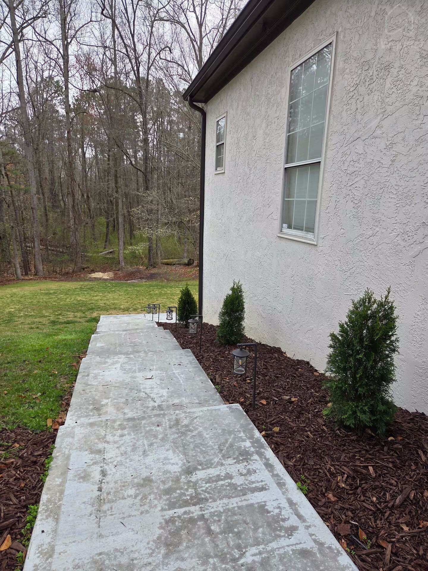 Stairs next to house. Follow these around to the private back yard to enter apartment. — New Modern 1 Bdr Apt 20 minutes from Atl airport, Sharpsburg, Georgia