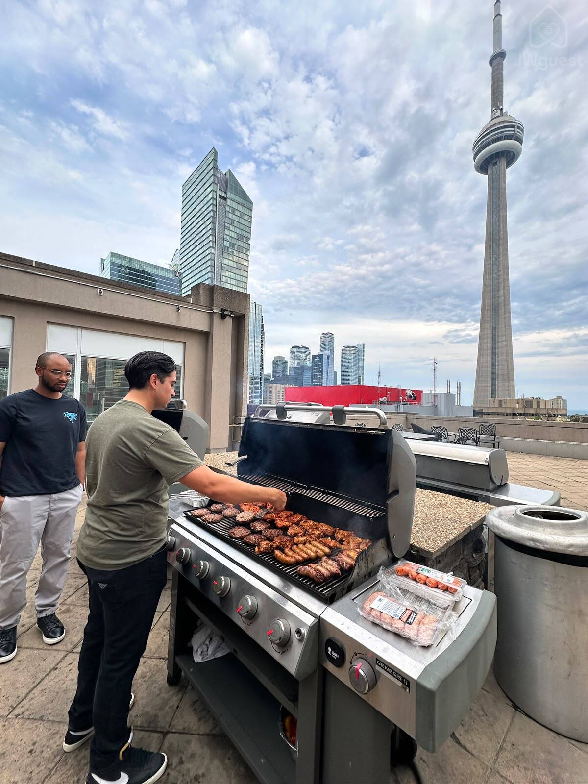 Rooftop BBQ area with an iconic CN Tower view — Downtown Toronto Stay | Steps from CN Tower & King West, Toronto, Ontario